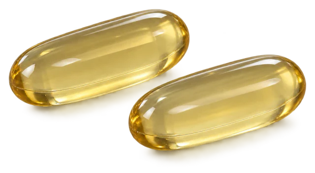 Illustration: two closed golden fish-oil softgels